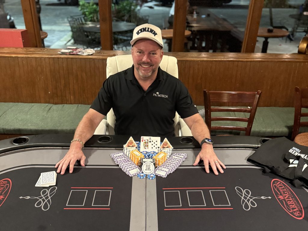 Chuck Poole celebrating his win at O'Shea's Pub Poker in West Palm Beach